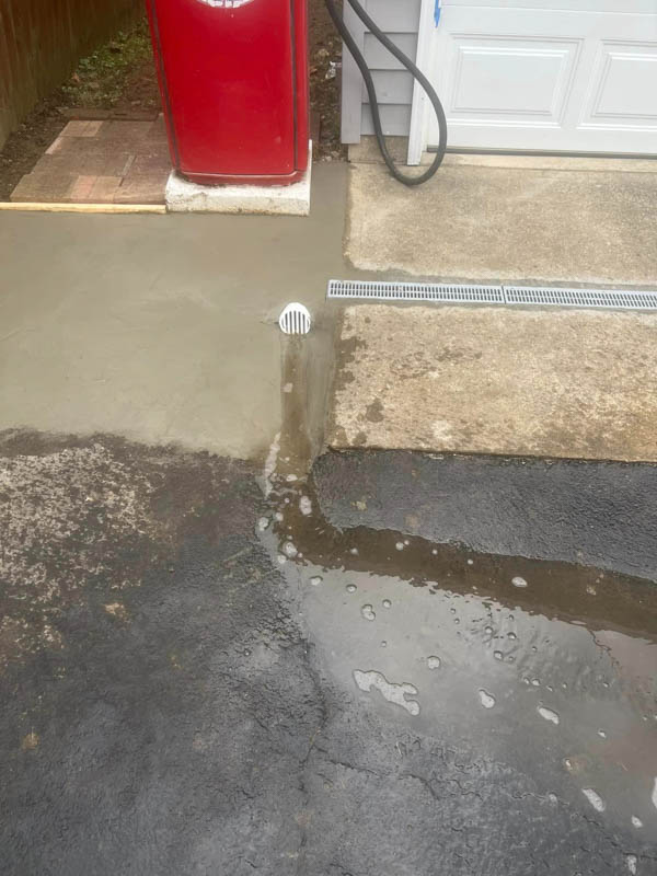 water flowing out of trench drain system springfield illinois