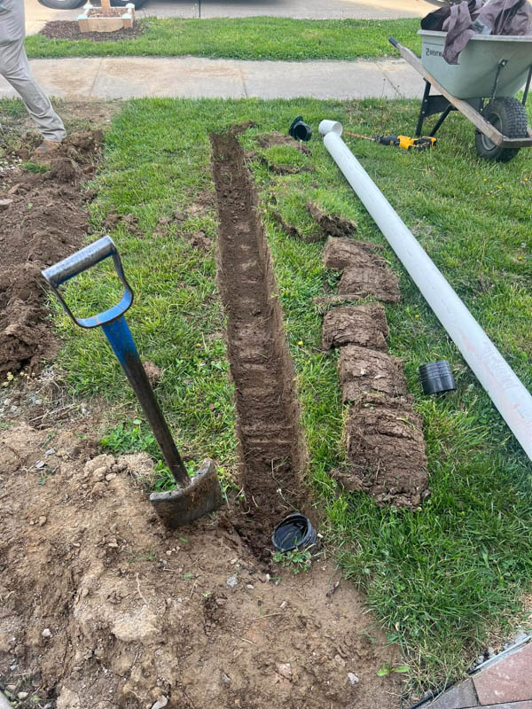 trench dug out to prepare for a french drain system springfield illinois