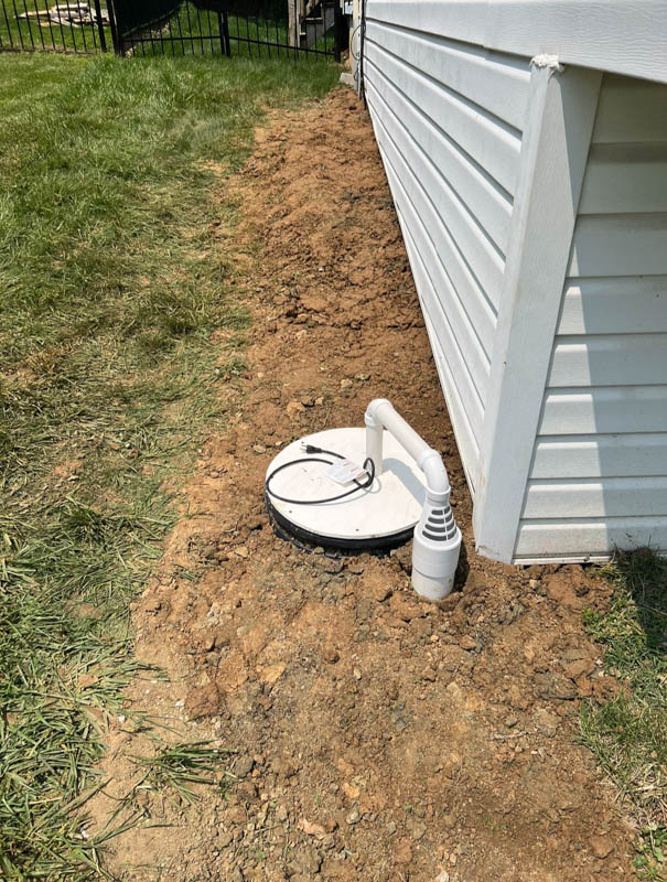 exterior sump pump installed outside of home springfield il